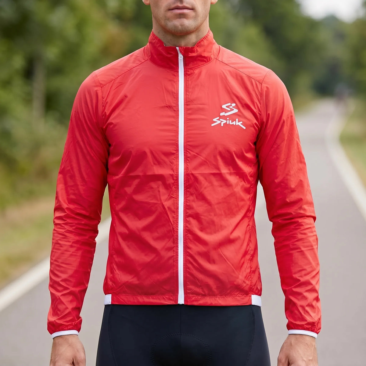 Lightweight cycling windbreaker with water-repellent finish and athletic fit