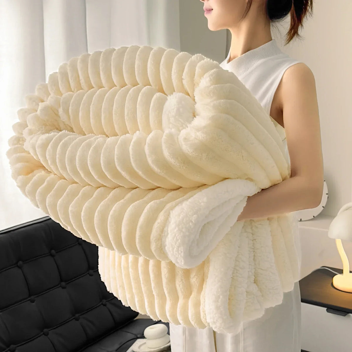 Thick plush throw blanket with soft pile and rib texture