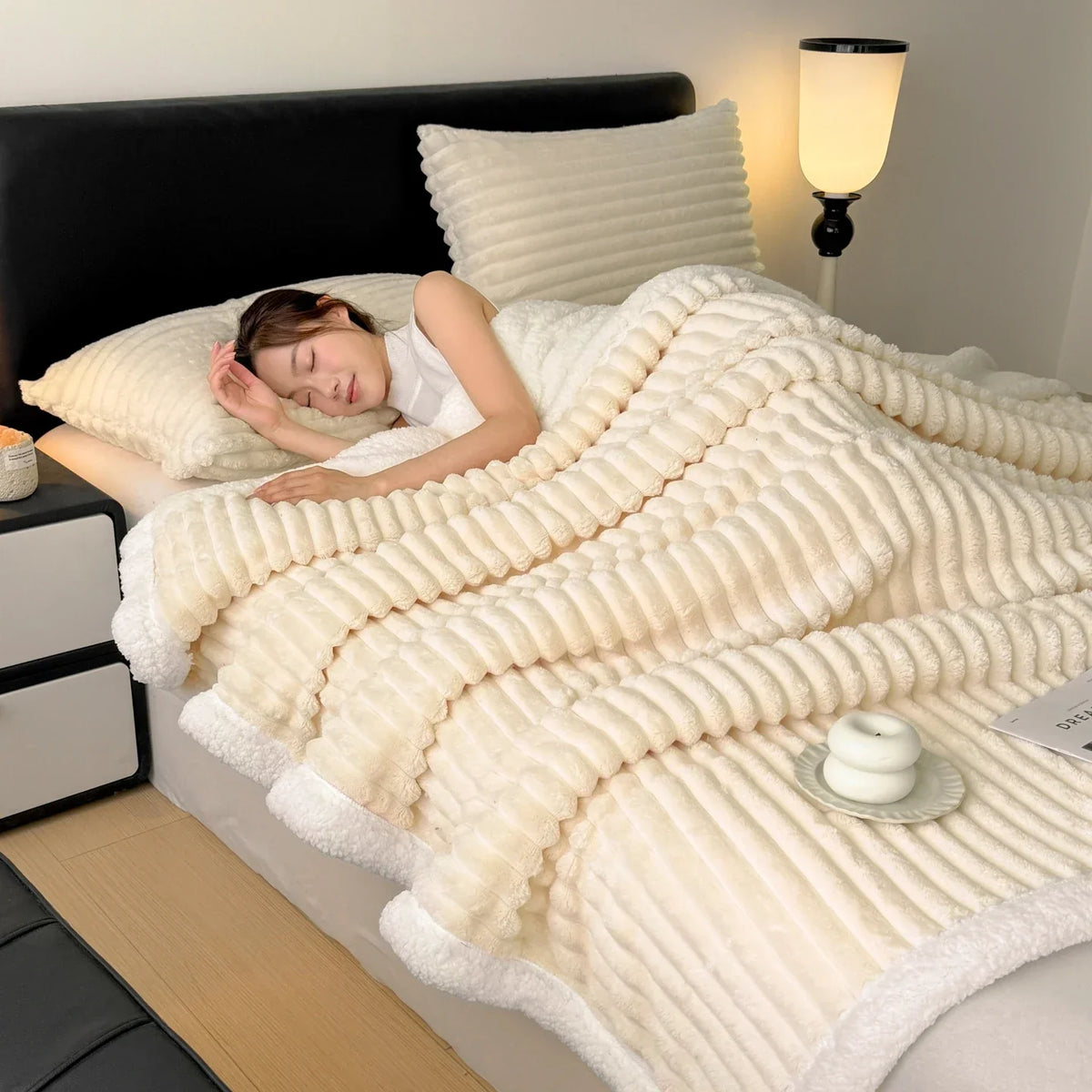 Thick plush throw blanket with soft pile and rib texture