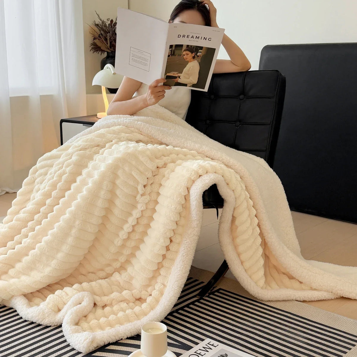 Thick plush throw blanket with soft pile and rib texture