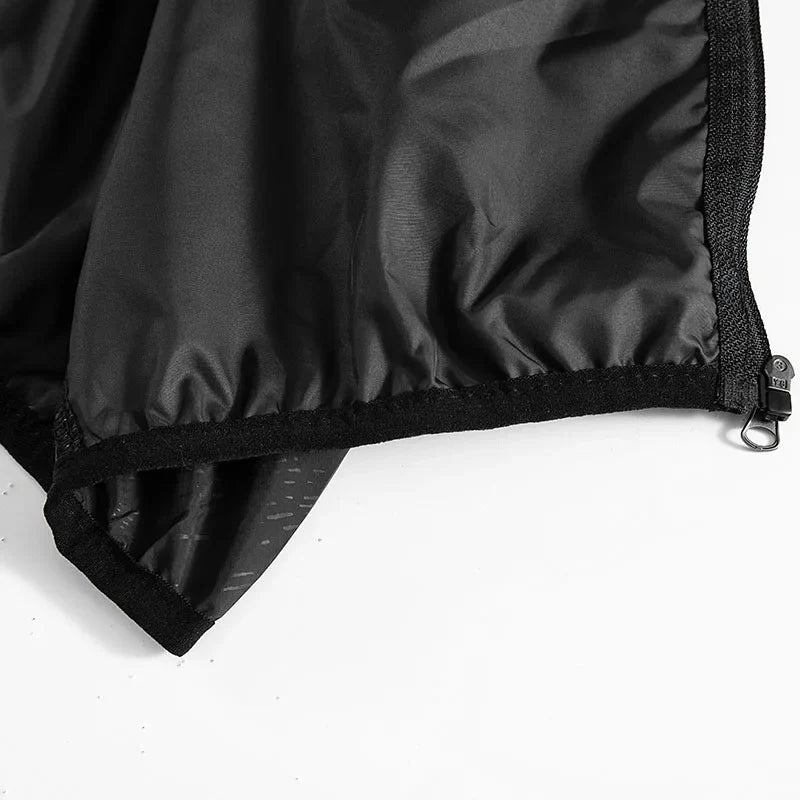 Lightweight hooded windbreaker with water-repellent fabric and packable design