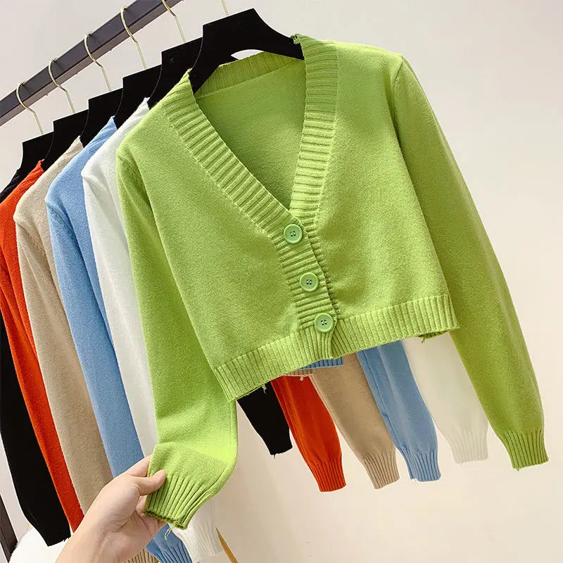 Cropped V-neck cardigan with lightweight textured fabric and ribbed trim