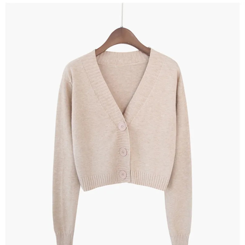 Cropped V-neck cardigan with lightweight textured fabric and ribbed trim