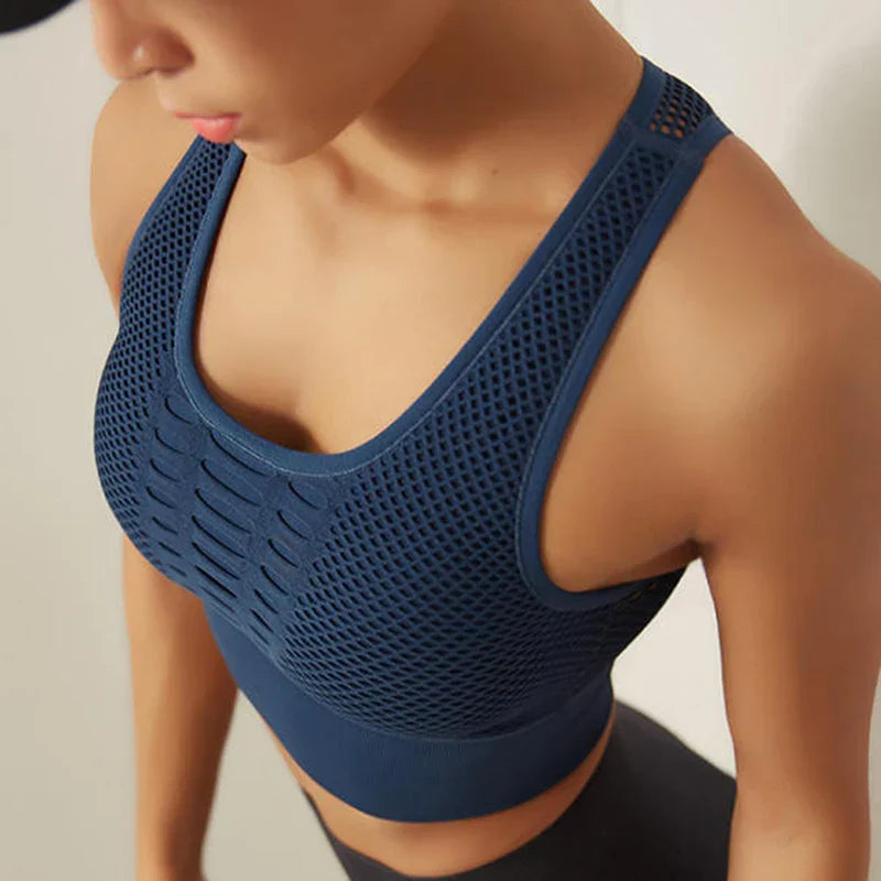 Backless crop sports top with ventilated design and supportive underband