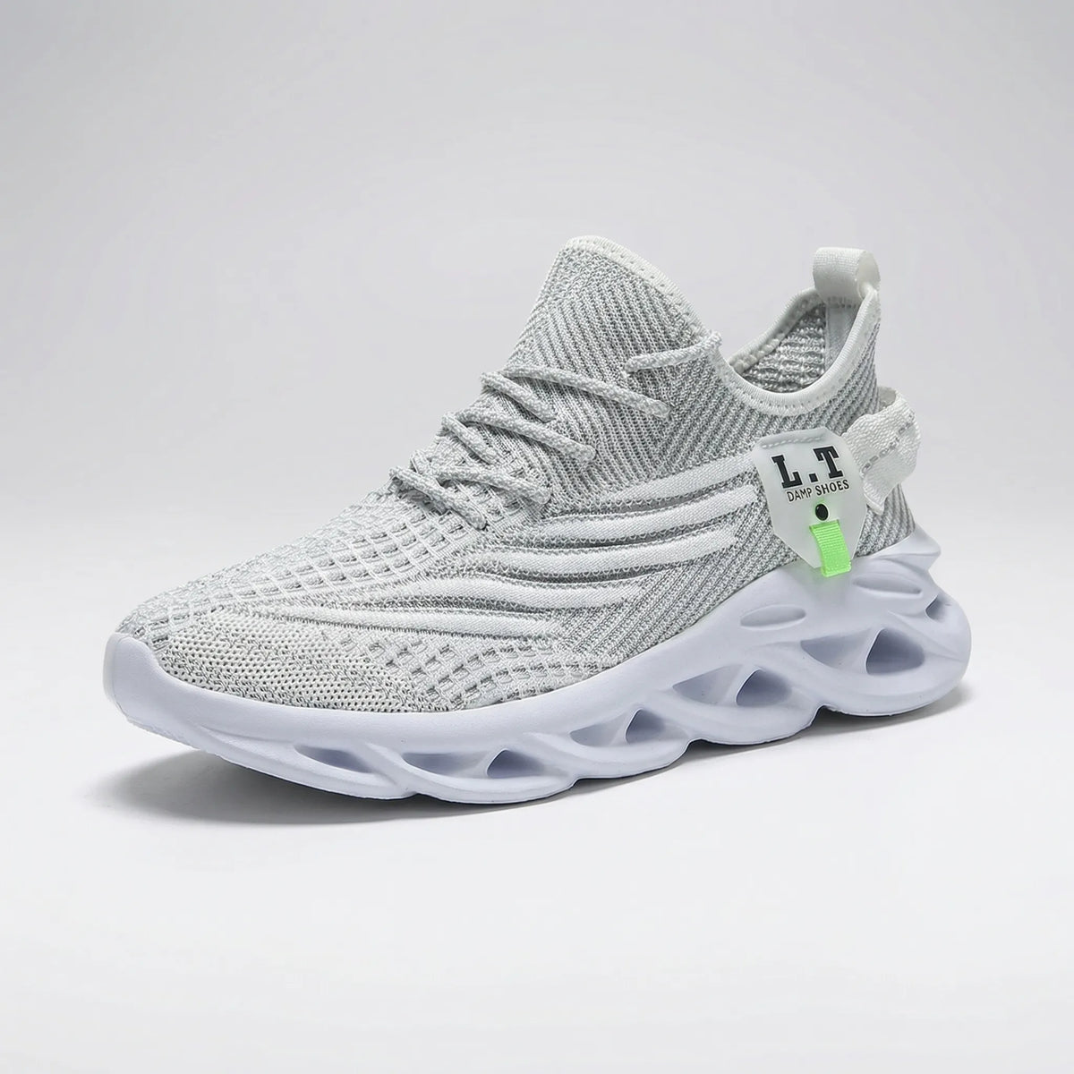 Lightweight running shoes with breathable mesh upper and wave-cut cushioning sole
