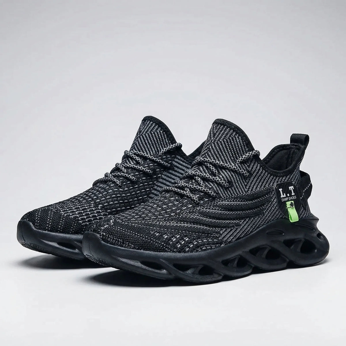 Lightweight running shoes with breathable mesh upper and wave-cut cushioning sole