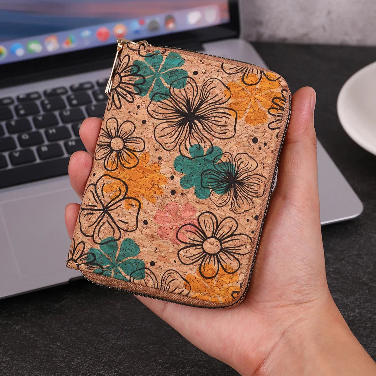 Compact zippered card wallet with vintage-inspired pattern and multiple card slots
