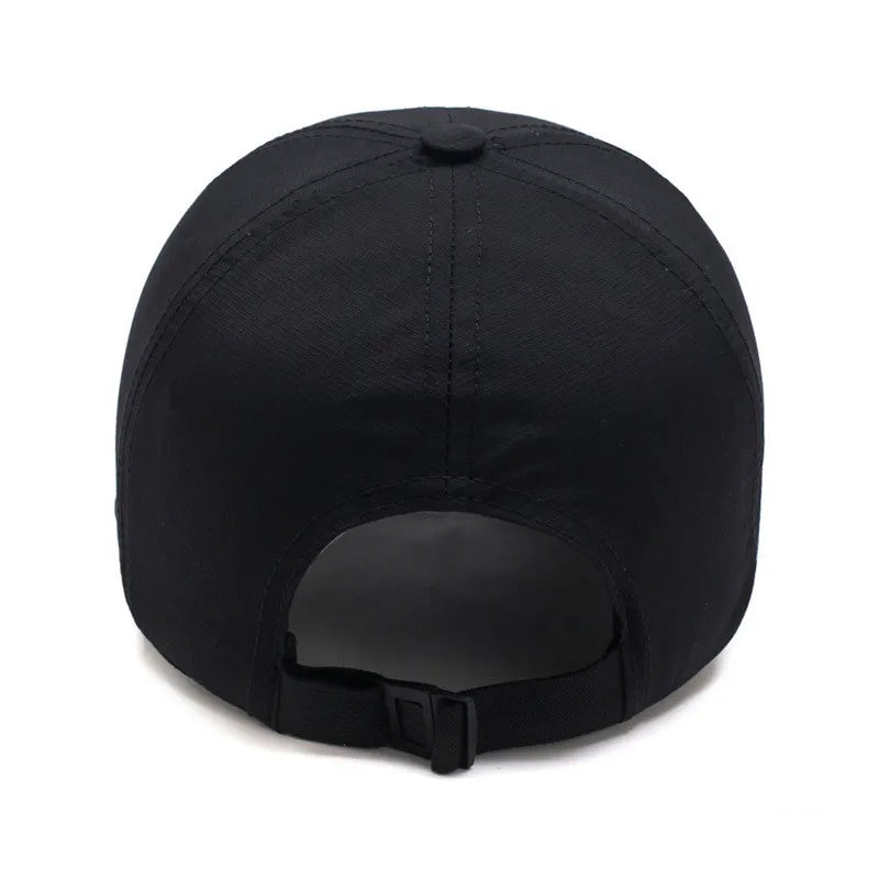 Unisex baseball cap with curved peak and snapback closure, solid colour