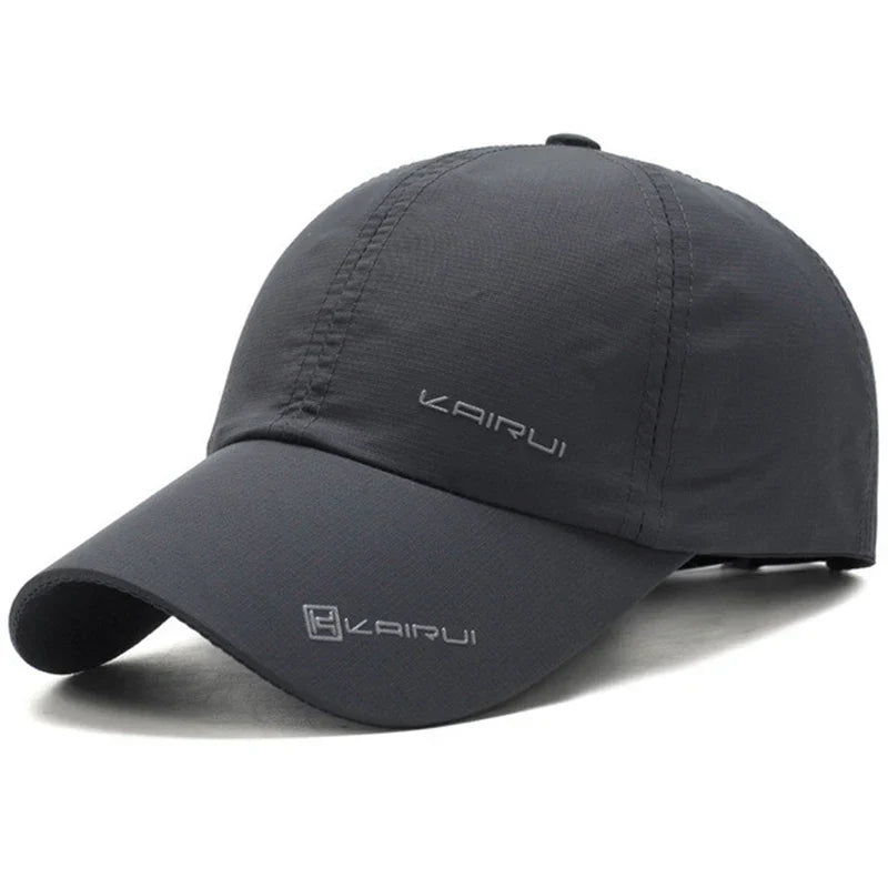 Unisex baseball cap with curved peak and snapback closure, solid colour