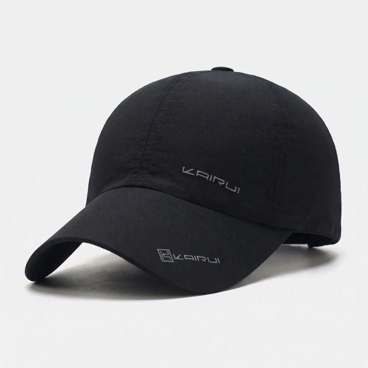 Unisex baseball cap with curved peak and snapback closure, solid colour