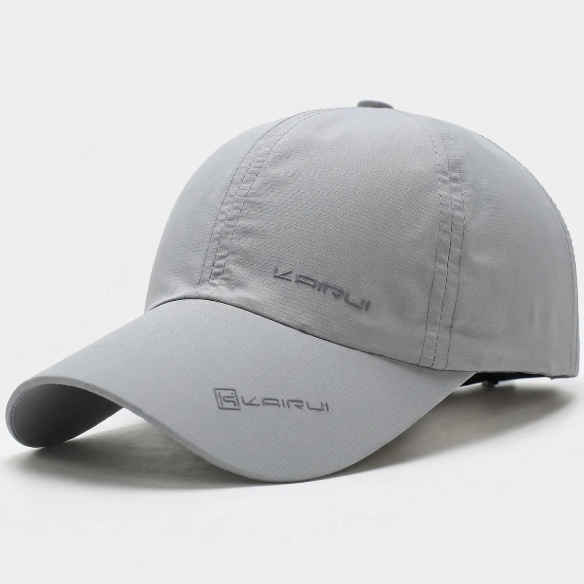 Unisex baseball cap with curved peak and snapback closure, solid colour