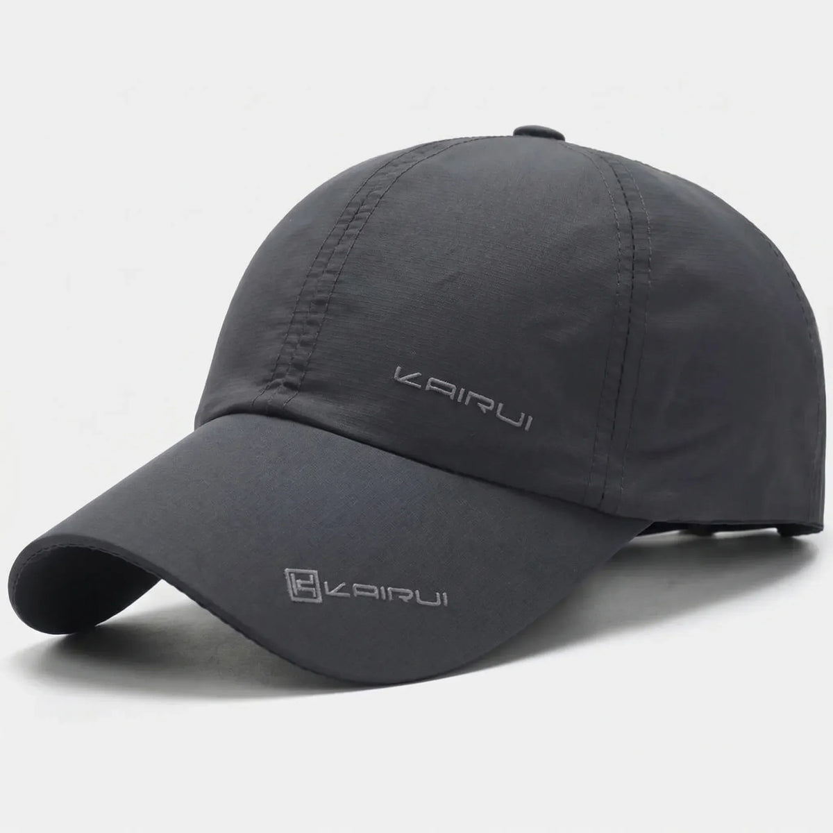 Unisex baseball cap with curved peak and snapback closure, solid colour