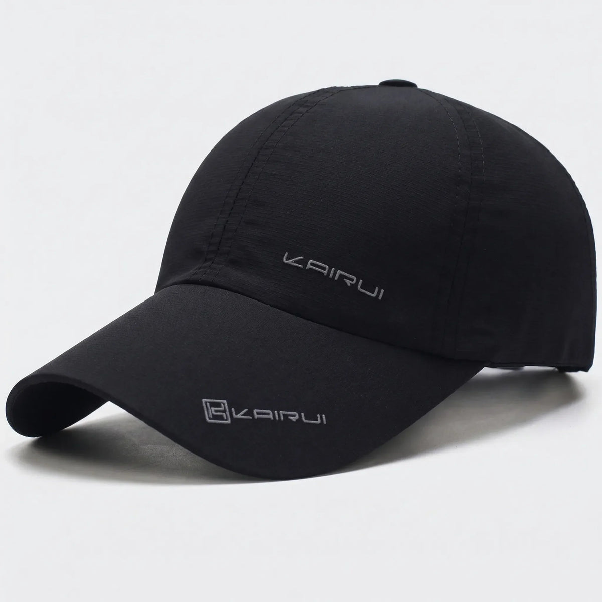 Unisex baseball cap with curved peak and snapback closure, solid colour