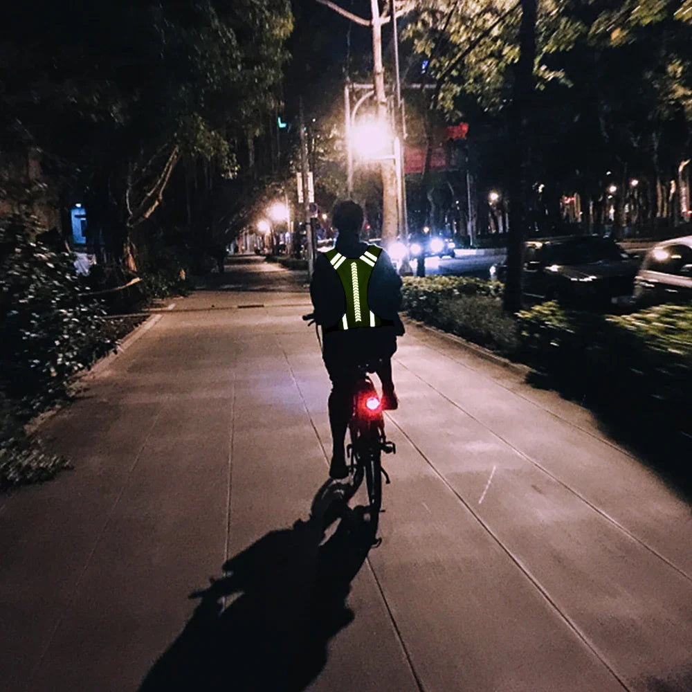 High-visibility reflective running vest with V-harness design and adjustable clips