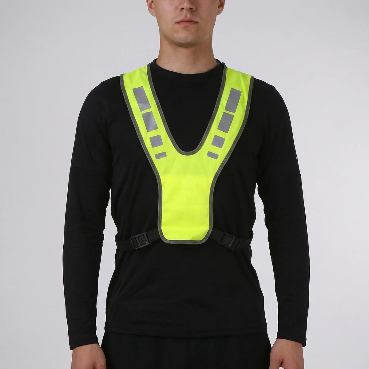 High-visibility reflective running vest with V-harness design and adjustable clips