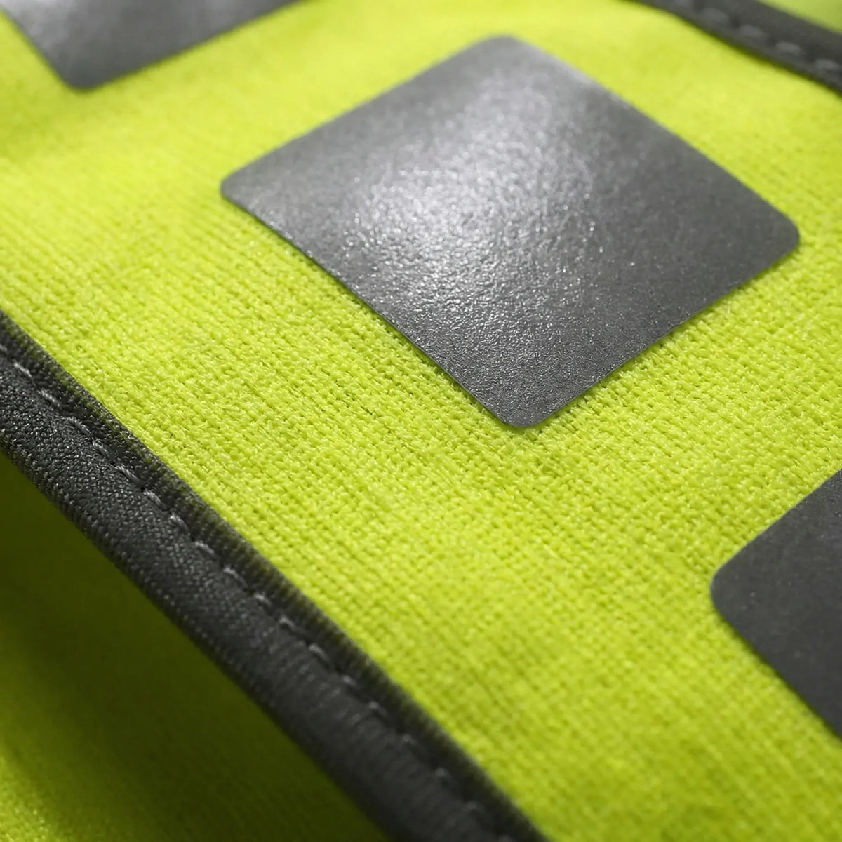 High-visibility reflective running vest with V-harness design and adjustable clips