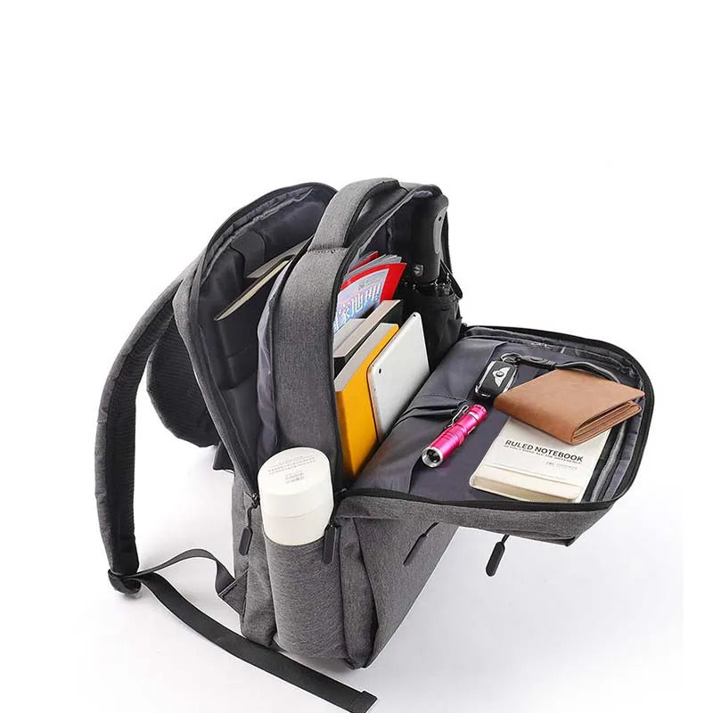 Water-resistant laptop backpack with padded compartment and multiple pockets