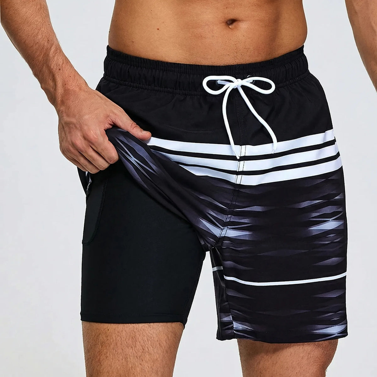 Athletic 2-in-1 swim shorts with inner lining and quick-dry outer layer