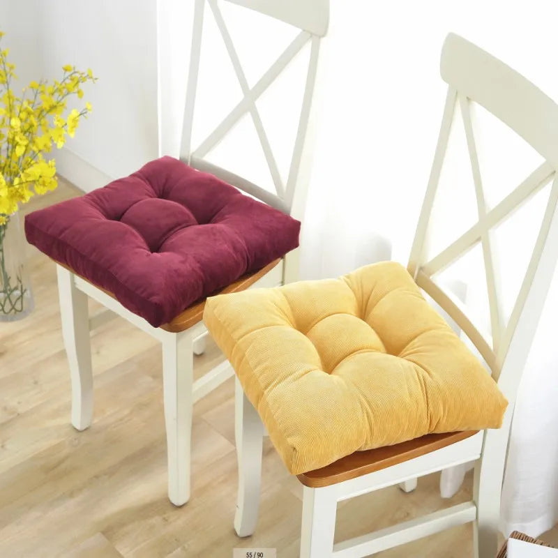 Square floor cushion with deep tufting and handcrafted detailing