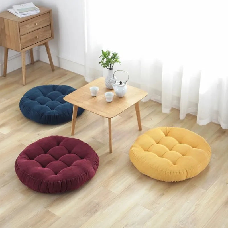 Large round floor cushion with tufted polyester support
