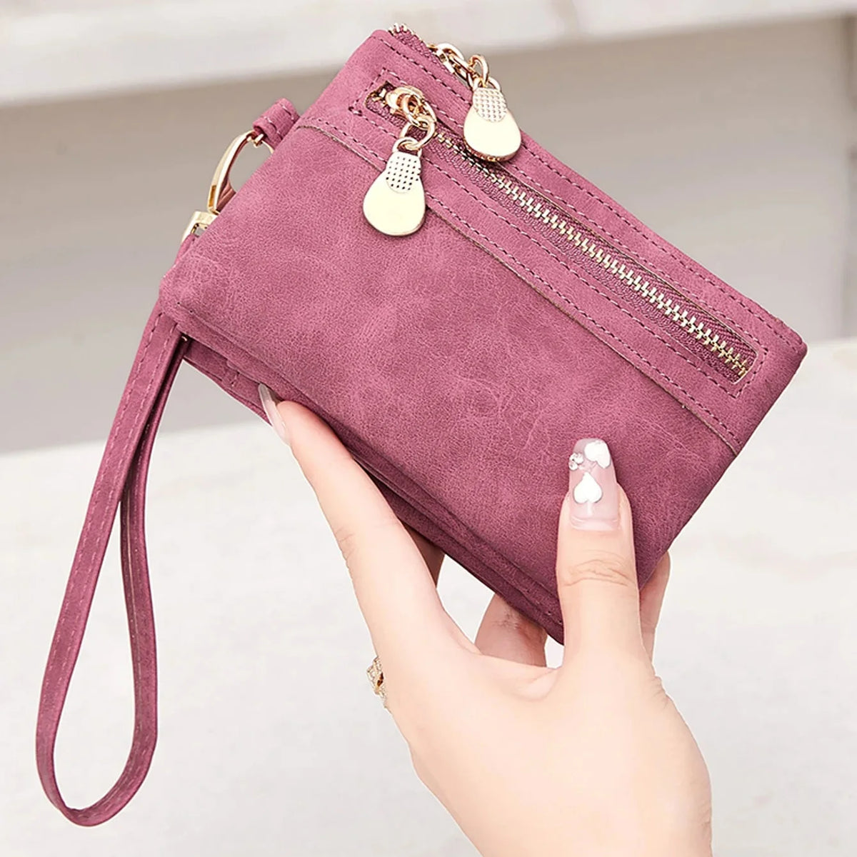 Compact short fold wristlet wallet with zipper coin pocket and card slots