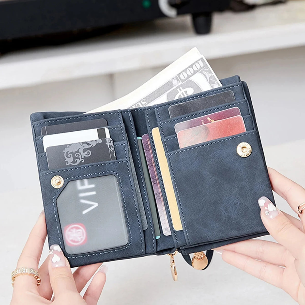 Compact short fold wristlet wallet with zipper coin pocket and card slots