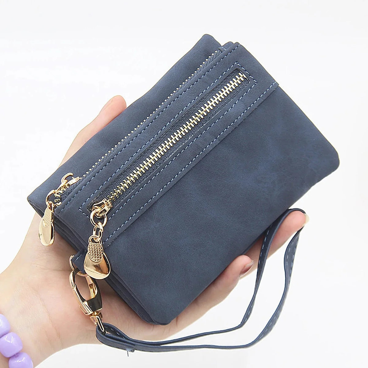 Compact short fold wristlet wallet with zipper coin pocket and card slots