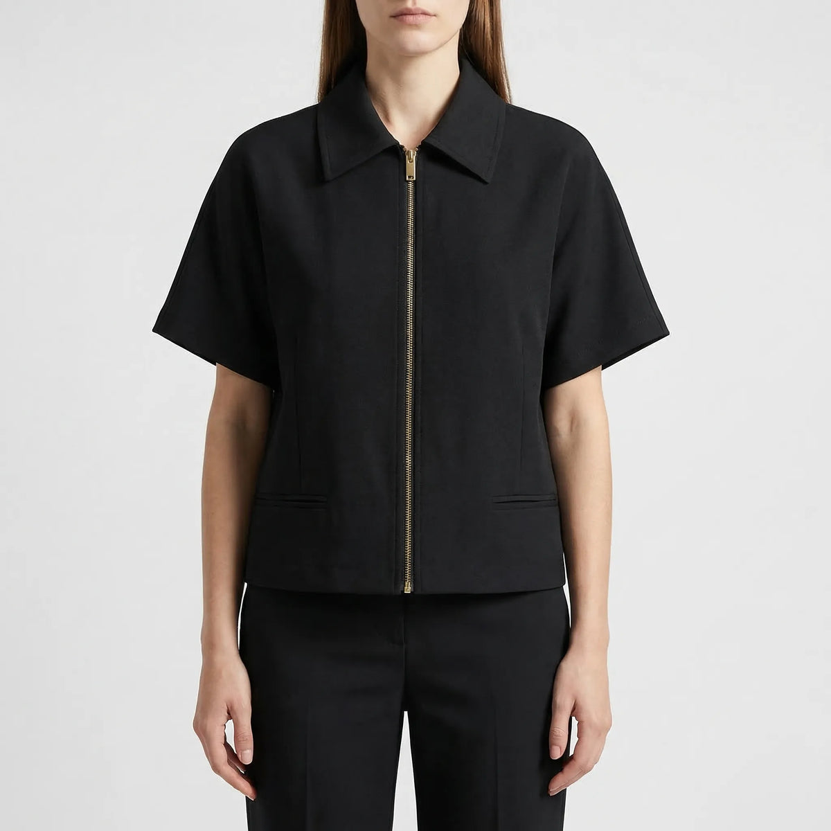Cropped short sleeve zip-up jacket with structured collar and front pockets