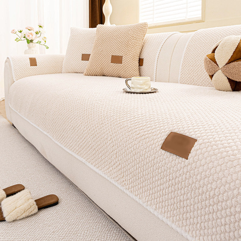 Non-slip sofa cover with textured design and stain-resistant fabric